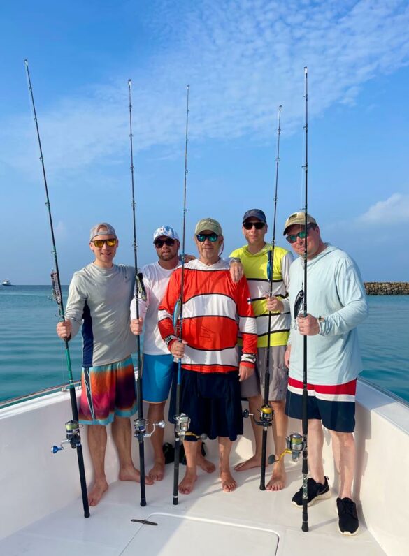 Malediven Gruppenbild mit Anglern auf dem Speedboot